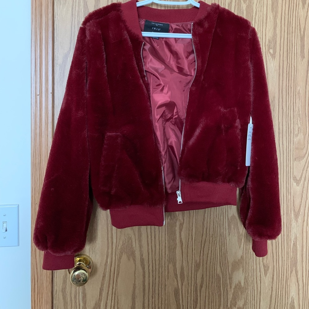 Burgundy size small bomber jacket.
